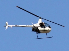 Tcnicos investigam um acidente com helicptero em vinhedo no interior de So Paulo