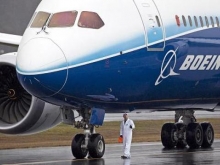 Notcia de avano em acordo com a Boeing faz Embraer subir 6%